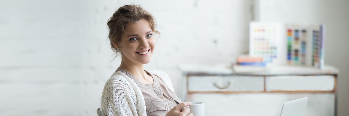 woman holding coffee mug