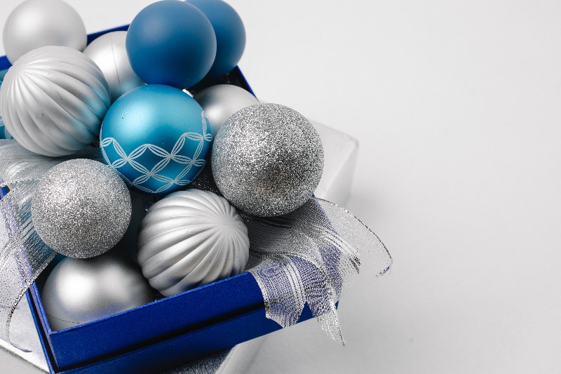 Box of blue and silver holiday ornaments