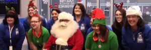 PSCU staff with Santa for Project Giveback 2021