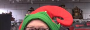 elf peeking over the counter