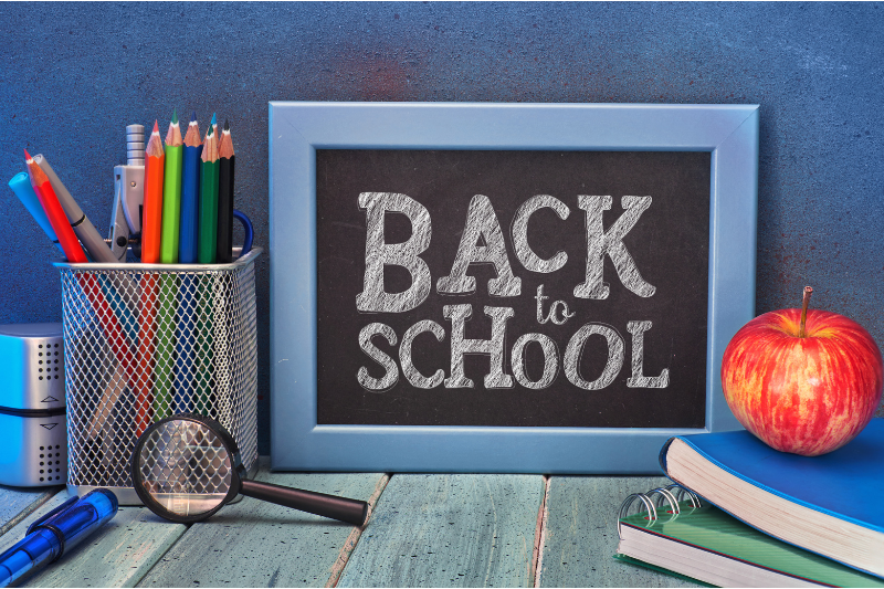 back to school chalkboard and supplies