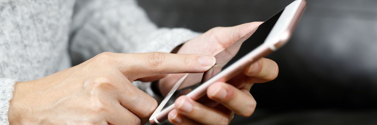 woman holding mobile phone